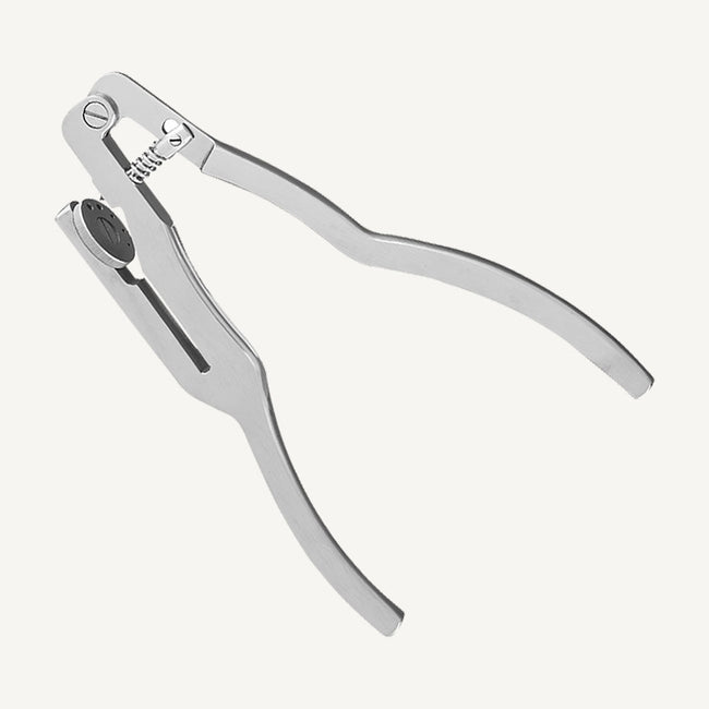 Ivory Rubber Dam Punch